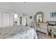 Bedroom with ensuite bathroom, closet, and furniture at 1581 S Waccamaw Dr. # 302, Garden City Beach, SC 29576