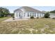 Back of house featuring patio with table and chairs and yard at 162 Jessica Lakes Dr., Conway, SC 29526