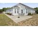 Back of house featuring patio with table and chairs and yard at 162 Jessica Lakes Dr., Conway, SC 29526