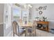 Sunny dining area with a round table and natural light at 162 Jessica Lakes Dr., Conway, SC 29526