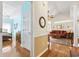 Entryway leading to a bedroom and a living room with hardwood floors at 162 Jessica Lakes Dr., Conway, SC 29526
