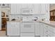 Well-equipped kitchen with a range and overhead microwave at 162 Jessica Lakes Dr., Conway, SC 29526