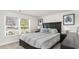 Comfortable bedroom with a large window and neutral decor providing a bright and inviting space at 177 Ashworth Dr., Tabor City, NC 28463