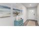 Inviting entryway featuring stylish decor, a blue console table, neutral walls, and durable flooring at 177 Ashworth Dr., Tabor City, NC 28463
