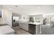 Well-lit, modern kitchen featuring an island, stainless steel appliances, and an open layout at 177 Ashworth Dr., Tabor City, NC 28463