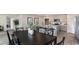 Open concept kitchen and dining area with modern finishes and stainless steel appliances at 177 Ashworth Dr., Tabor City, NC 28463