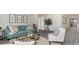 Comfortable living room featuring stylish furnishings, neutral decor, and ample natural light at 177 Ashworth Dr., Tabor City, NC 28463