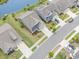 Overhead view of the neighborhood and a green-painted house situated on an immaculately maintained property at 1827 Parish Way, Myrtle Beach, SC 29577