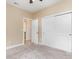 Cozy bedroom with neutral walls and carpet, featuring a sliding door closet and connecting bathroom at 1827 Parish Way, Myrtle Beach, SC 29577