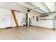 Spacious garage with epoxy floor, ample storage, and a door leading to the home's interior at 1827 Parish Way, Myrtle Beach, SC 29577