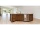 Kitchen island featuring granite counters, stainless steel dishwasher, and dark brown cabinetry at 1827 Parish Way, Myrtle Beach, SC 29577