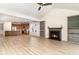 Open-concept space with a fireplace, built-in shelves, and seamless flow to the modern kitchen at 1827 Parish Way, Myrtle Beach, SC 29577