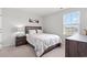 Unwind in this bedroom, featuring a queen bed, soft lighting, and a tranquil view at 189 Timber Oaks Dr., Myrtle Beach, SC 29588