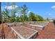Well-maintained community garden with numerous raised planting beds at 189 Timber Oaks Dr., Myrtle Beach, SC 29588