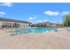 Large community pool with plenty of lounge chairs and a covered area for relaxation at 189 Timber Oaks Dr., Myrtle Beach, SC 29588