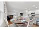 Open floor plan connects a well lit dining space to the living area and a modern kitchen at 189 Timber Oaks Dr., Myrtle Beach, SC 29588