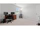 Well-lit home office with a wooden desk and neutral color palette at 189 Timber Oaks Dr., Myrtle Beach, SC 29588