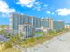 Aerial view of beachfront resort with pools, beach access, and ocean views at 200 72Nd Ave. N # 501, Myrtle Beach, SC 29572