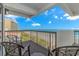 Spacious balcony with seating offers a view of the ocean, beach, and surrounding buildings at 200 72Nd Ave. N # 501, Myrtle Beach, SC 29572