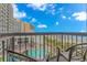 Balcony overlooking a pool, the ocean and beach provides a relaxing vacation spot at 200 72Nd Ave. N # 501, Myrtle Beach, SC 29572
