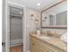 Well lit bathroom with a granite countertop vanity and view of shower/tub combo at 200 72Nd Ave. N # 501, Myrtle Beach, SC 29572