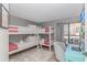 Bunk beds with a white frame and guest seating near a balcony and desk at 200 72Nd Ave. N # 501, Myrtle Beach, SC 29572