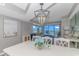 Elegant dining room with ocean views and stylish lighting fixtures at 200 72Nd Ave. N # 501, Myrtle Beach, SC 29572