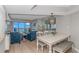Beautiful condo living room with ocean view, dining area, and modern decor at 200 72Nd Ave. N # 501, Myrtle Beach, SC 29572