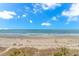 Expansive sandy beach with sunbathers along the ocean view at 200 72Nd Ave. N # 501, Myrtle Beach, SC 29572