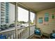 Relaxing screened balcony with views of the ocean and the beach at 210 N Ocean Blvd. # 234, North Myrtle Beach, SC 29582