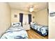 Bright bedroom featuring two twin beds with coastal-themed bedding and decor at 210 N Ocean Blvd. # 234, North Myrtle Beach, SC 29582