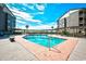 Sparkling outdoor pool surrounded by lounge chairs and well-maintained decks, perfect for relaxation at 210 N Ocean Blvd. # 234, North Myrtle Beach, SC 29582
