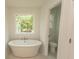 Bathroom boasts a soaking tub and a separate toilet at 2212 Dykman Circle, Little River, SC 29566
