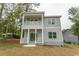 Charming two-story home features double porches and manicured front lawn at 2212 Dykman Circle, Little River, SC 29566