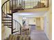 View of main living space, spiral stairs to loft area, dining area and partial kitchen at 223 Maison Dr. # D-16, Myrtle Beach, SC 29572