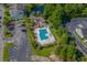 Community pool area with shaded lounge chairs and manicured landscaping at 2262 Andover Dr. # E, Surfside Beach, SC 29575