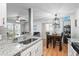 Open concept with stainless sink and granite counters in the kitchen at 2262 Andover Dr. # E, Surfside Beach, SC 29575