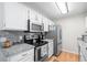Bright kitchen with stainless steel appliances and granite countertops at 2262 Andover Dr. # E, Surfside Beach, SC 29575