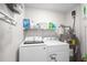 Laundry room featuring a Samsung washer and dryer with extra storage space above at 2262 Andover Dr. # E, Surfside Beach, SC 29575