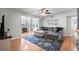 Comfortable living room featuring a ceiling fan, work space, and plenty of natural light at 2262 Andover Dr. # E, Surfside Beach, SC 29575