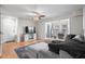Bright living room with hardwood floors and an open concept design at 2262 Andover Dr. # E, Surfside Beach, SC 29575