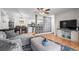 View of open living area with kitchen, dining, and living room featuring hardwood floors at 2262 Andover Dr. # E, Surfside Beach, SC 29575