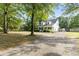 Charming home featuring a classic front porch, inviting curb appeal, and a serene setting at 228 Hopeland St., Pawleys Island, SC 29585