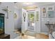 Foyer featuring wood floors and decorative wall art at 228 Hopeland St., Pawleys Island, SC 29585