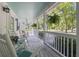 Spacious front porch features rocking chairs and ample room for relaxing at 228 Hopeland St., Pawleys Island, SC 29585