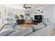 Cozy living room with a sectional sofa, window, and stylish decor at 228 Hopeland St., Pawleys Island, SC 29585