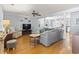 Open living room with wood floors, ceiling fan and neutral decor at 228 Hopeland St., Pawleys Island, SC 29585