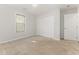 Bedroom with closet, large window, and neutral carpet at 2405 Brick Dr., Longs, SC 29568