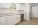Bright kitchen featuring tile floors, stainless steel appliances, and white cabinets at 2405 Brick Dr., Longs, SC 29568