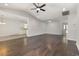Open living area with dark wood flooring and an adjacent kitchen area at 2405 Brick Dr., Longs, SC 29568